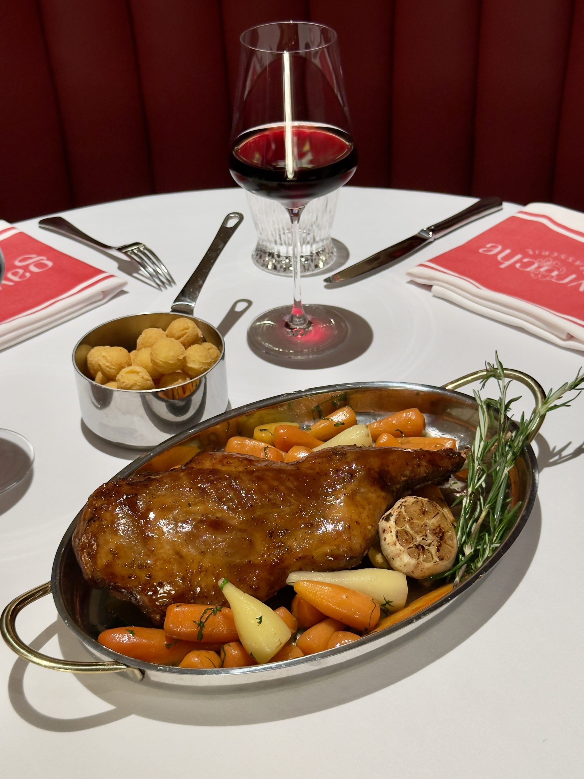 GIGOT D’AGNEAU DES PYRÉNÉES - FRANCE (SERVES 2-3) Slow Roast Leg of Baby Lamb, Glazed Baby carrots and “Pommes Noisettes”, Lamb Rosemary Jus